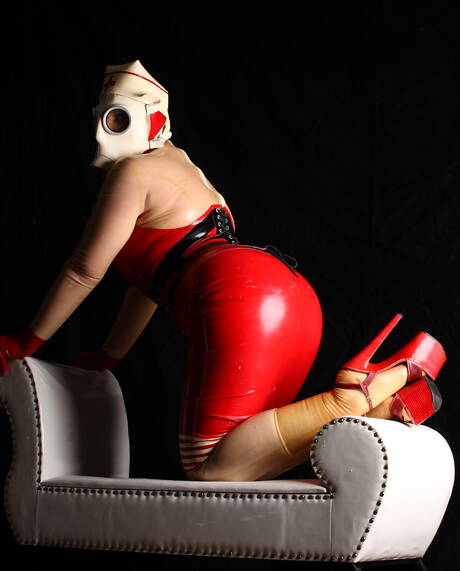 Rubber Tits are excited to present you with xxx gallery showcasing miss in female domination porn